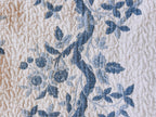 Blue and White Floral Quilt
