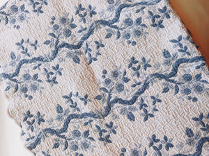 Blue and White Floral Quilt