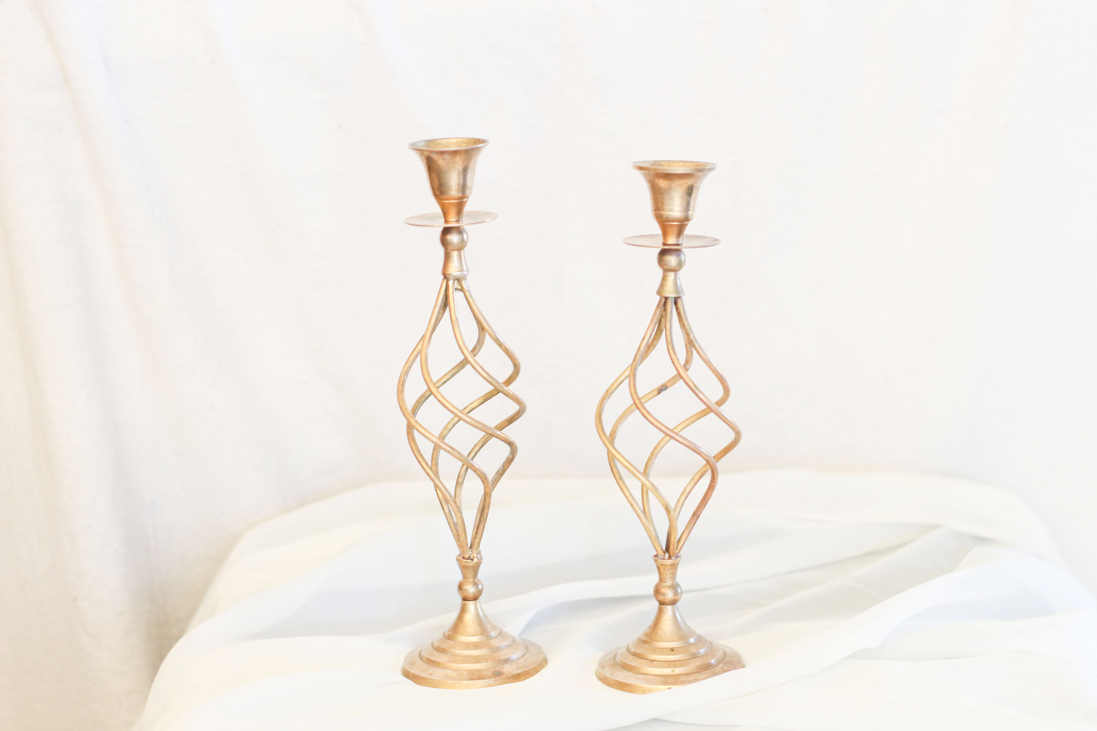 Pair of Swirling Brass Candle Holders