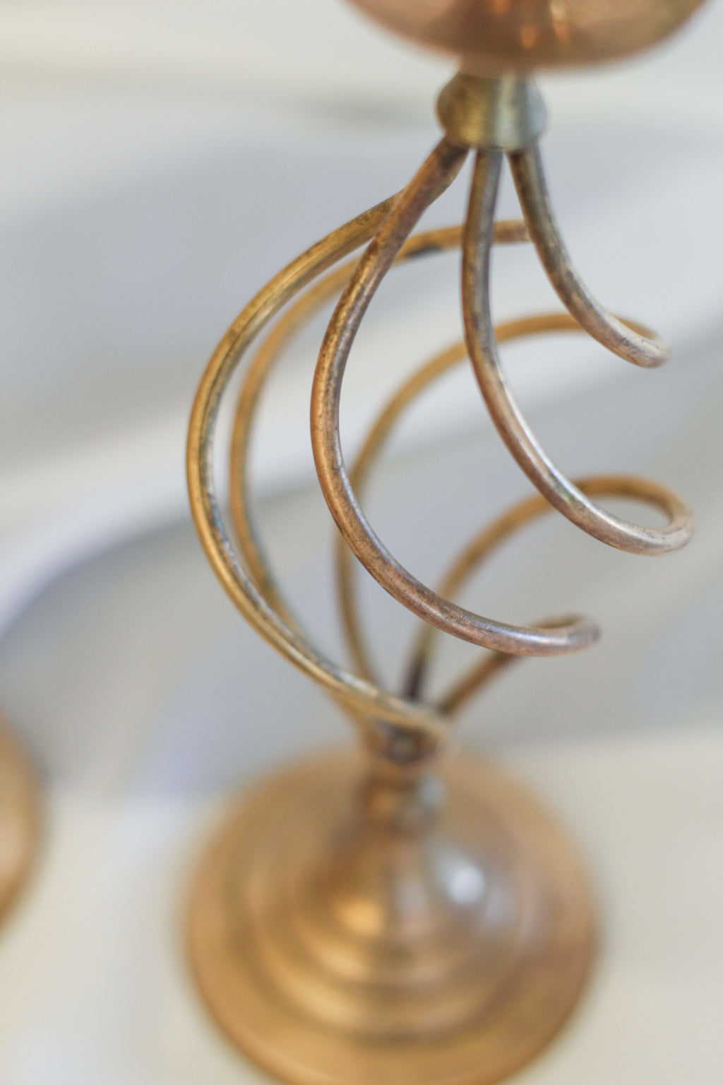 Pair of Swirling Brass Candle Holders